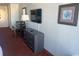 Desk, dresser, TV, and chair in bedroom at 1501 S Ocean Blvd. # 815, Myrtle Beach, SC 29577