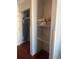 Shelving and ironing board in closet at 1501 S Ocean Blvd. # 815, Myrtle Beach, SC 29577