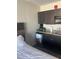 Small kitchenette with microwave, coffee maker, and mini-fridge at 1501 S Ocean Blvd. # 815, Myrtle Beach, SC 29577