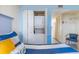 Bedroom with stacked washer and dryer, visible from the beds at 2201 S Ocean Blvd. # 1705, Myrtle Beach, SC 29577