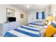 Guest bedroom with two twin beds, dresser, and ocean view at 2201 S Ocean Blvd. # 1705, Myrtle Beach, SC 29577