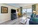 Living room boasts an ocean view, comfortable seating, and coastal decor at 2201 S Ocean Blvd. # 1705, Myrtle Beach, SC 29577
