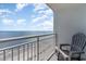 Balcony with chairs and an expansive ocean view at 2201 S Ocean Blvd. # 1705, Myrtle Beach, SC 29577