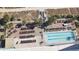 Overhead view of resort-style pool and deck area with lounge chairs at 2201 S Ocean Blvd. # 1705, Myrtle Beach, SC 29577