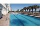 Resort-style pool with plenty of lounge chairs for relaxing at 2201 S Ocean Blvd. # 1705, Myrtle Beach, SC 29577