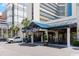 Ocean Reef Resort's inviting entrance features a covered area and seating at 7100 N Ocean Blvd. N # 1213, Myrtle Beach, SC 29572