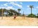 Beachfront volleyball court with people playing at 7100 N Ocean Blvd. N # 1213, Myrtle Beach, SC 29572