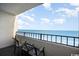 Balcony with ocean view and seating for two at 7100 N Ocean Blvd. N # 1213, Myrtle Beach, SC 29572