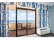 Bedroom with ocean view and access to balcony at 7100 N Ocean Blvd. N # 1213, Myrtle Beach, SC 29572