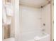 Bathroom with shower/tub combo and white tile at 7100 N Ocean Blvd. N # 1213, Myrtle Beach, SC 29572