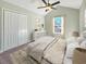 Bedroom with a queen bed, ceiling fan, and window at 370 Long Meadow Dr., Loris, SC 29569