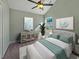 Bedroom with a queen bed, ceiling fan, and window at 370 Long Meadow Dr., Loris, SC 29569
