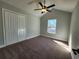 Bright bedroom with carpeted floor and double door closet at 370 Long Meadow Dr., Loris, SC 29569
