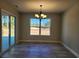 Bright dining area with tile floors and a chandelier at 370 Long Meadow Dr., Loris, SC 29569