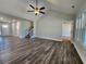 Spacious living area with hardwood floors and staircase at 370 Long Meadow Dr., Loris, SC 29569