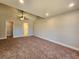 Large bedroom featuring a walk-in closet and private bathroom access at 370 Long Meadow Dr., Loris, SC 29569