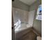 Bathroom with bathtub and window at 370 Long Meadow Dr., Loris, SC 29569