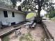 Relaxing backyard patio with picnic table, umbrella, and seating at 506 Maple St., Myrtle Beach, SC 29577
