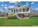 Two story house with a large front porch and a metal roof at 478 Riverfront Rd., Conway, SC 29527