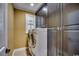 Laundry room with dark cabinets and washer and dryer at 478 Riverfront Rd., Conway, SC 29527
