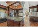 Spacious kitchen with large island, dark wood cabinetry, and high-end appliances at 101 Greenwich Dr., Georgetown, SC 29440