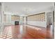 Bright living room with hardwood floors, fireplace, and large windows at 101 Greenwich Dr., Georgetown, SC 29440