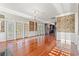 Open living area with hardwood floors, access to kitchen, and abundant natural light at 101 Greenwich Dr., Georgetown, SC 29440