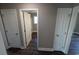 Bright hallway with doors to bedrooms and bathroom at 4189 Valley Forge Rd., Aynor, SC 29511