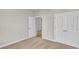 Bright bedroom with double door closet and access to hallway at 1224 Colusa Ct., Little River, SC 29566