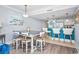 Bright dining area with a large table and seating for six at 603 S Ocean Blvd. # 1115, North Myrtle Beach, SC 29582