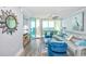 Open living room with hardwood floors and a view at 603 S Ocean Blvd. # 1115, North Myrtle Beach, SC 29582