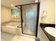 Spa-like bathroom with soaking tub, walk-in shower, and granite vanity at 603 S Ocean Blvd. # 1115, North Myrtle Beach, SC 29582