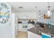 Fully equipped kitchen with granite counters and island at 603 S Ocean Blvd. # 1115, North Myrtle Beach, SC 29582