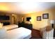 Guest bedroom offering two double beds, a seating area, and kitchenette at 1501 S Ocean Blvd. # 622, Myrtle Beach, SC 29577