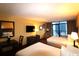 Guest bedroom with two double beds, TV, and balcony access at 1501 S Ocean Blvd. # 622, Myrtle Beach, SC 29577