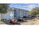 Two-story building with parking and landscaping at 7700 Porcher Dr. # 3207, Myrtle Beach, SC 29572