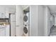 Convenient laundry closet with stacked washer and dryer at 300 N Ocean Blvd. # 1520, North Myrtle Beach, SC 29582