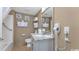 Bathroom with granite countertop, shower/tub combo, and beachy decor at 300 N Ocean Blvd. # 1520, North Myrtle Beach, SC 29582