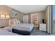 Bedroom with two twin beds and en-suite bathroom at 300 N Ocean Blvd. # 1520, North Myrtle Beach, SC 29582