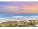 Sunset over the ocean from a beachfront property at 4800 S Ocean Blvd. # 615, North Myrtle Beach, SC 29582