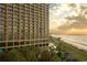 Oceanfront resort at sunset with pool and landscaping at 4800 S Ocean Blvd. # 615, North Myrtle Beach, SC 29582