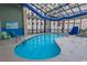 Indoor pool beneath a glass atrium at 4800 S Ocean Blvd. # 615, North Myrtle Beach, SC 29582