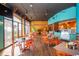 Town center restaurant with orange chairs and ocean views at 4800 S Ocean Blvd. # 615, North Myrtle Beach, SC 29582
