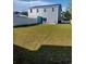 Large backyard with grassy lawn, perfect for entertaining at 503 30Th Ave. N, Myrtle Beach, SC 29577