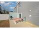 Small patio with pink picnic table and gas grill at 503 30Th Ave. N, Myrtle Beach, SC 29577