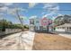 Two-story duplex with gray and light-pink siding at 503 30Th Ave. N, Myrtle Beach, SC 29577