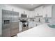 Modern kitchen with stainless steel appliances and white cabinets at 503 30Th Ave. N, Myrtle Beach, SC 29577
