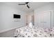 Cozy bedroom with a bed featuring a seashell-themed comforter and a ceiling fan at 503 30Th Ave. N, Myrtle Beach, SC 29577