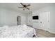 Bright bedroom featuring a starfish-themed bedspread and a flat-screen TV at 503 30Th Ave. N, Myrtle Beach, SC 29577