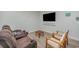 Relaxing living room with two brown leather recliners and a flat screen TV at 503 30Th Ave. N, Myrtle Beach, SC 29577